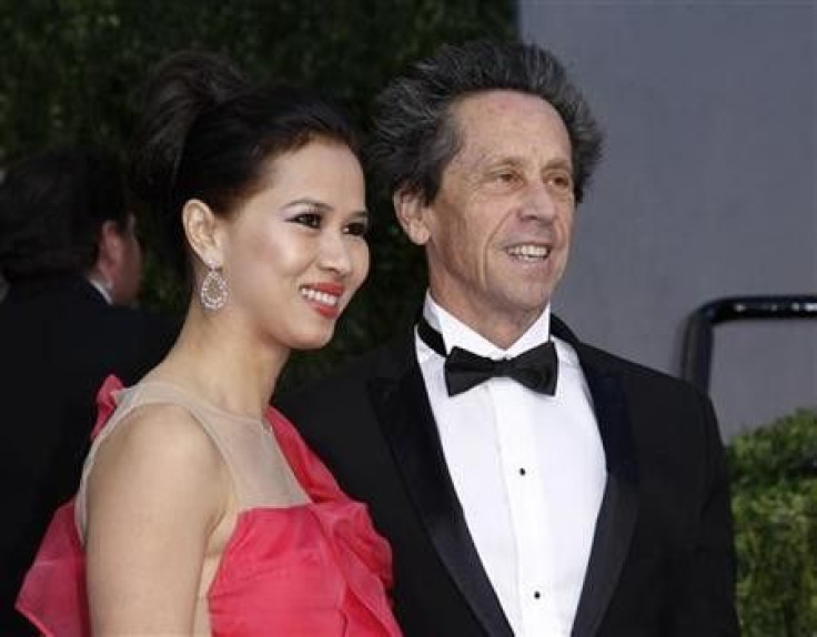 Producer Brian Grazer and wife Gigi Grazer arrive at the 2011 Vanity Fair Oscar party in West Hollywood, California