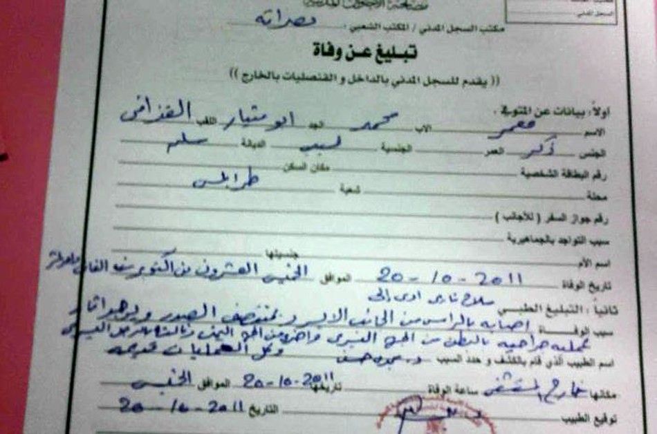 The death certificate of Muammar Gaddafi is seen in Misrata October 21, 2011. The certificate reads, quotCivil Record Office Popular Office Misrata, Informing of a Death, Name Moammar, Father Mohammed, Grandfather Abu Mithyar, Surname Gaddafi, Sex