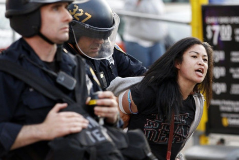 A woman is arrested during an anti-Wall Street protest in Oakland, California