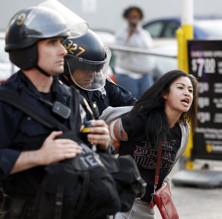 A woman is arrested during an anti-Wall Street protest in Oakland, California