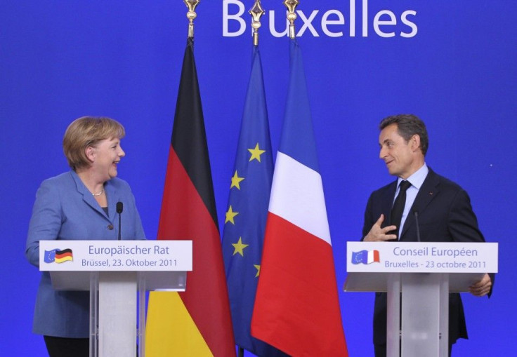 German Chancellor Merkel and France&#039;s President Sarkozy hold a joint briefing at the EU summit in Brussels