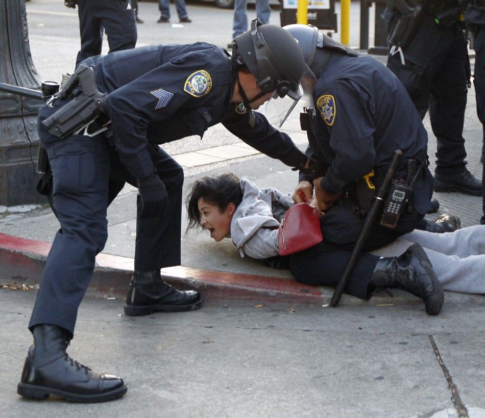 A woman is arrested during an anti-Wall Street protest in Oakland 