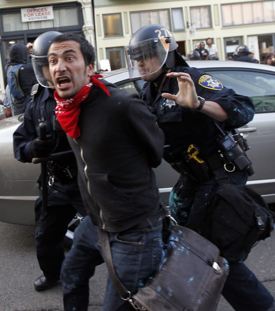 Police arrest a man during an anti-Wall Street protest in Oakland