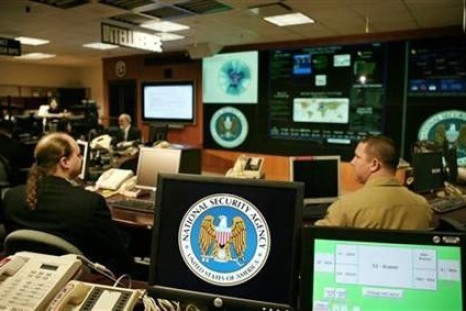 The National Security Agency (NSA) logo is shown on a computer screen inside the Threat Operations Center at the NSA in Fort Meade, Maryland