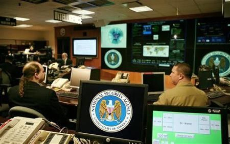 The National Security Agency (NSA) logo is shown on a computer screen inside the Threat Operations Center at the NSA in Fort Meade, Maryland