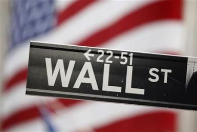 A street sign stands outside of the New York Stock Exchange