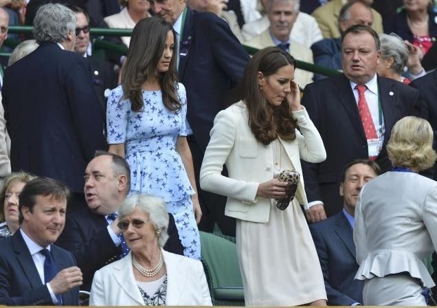 Kate and Pipa Middleton walk to their seats at the Wimbledon Men039s Final