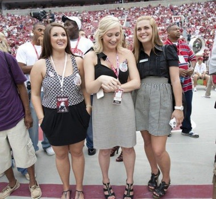 Kristen Saban, center, at an Alabama football game.