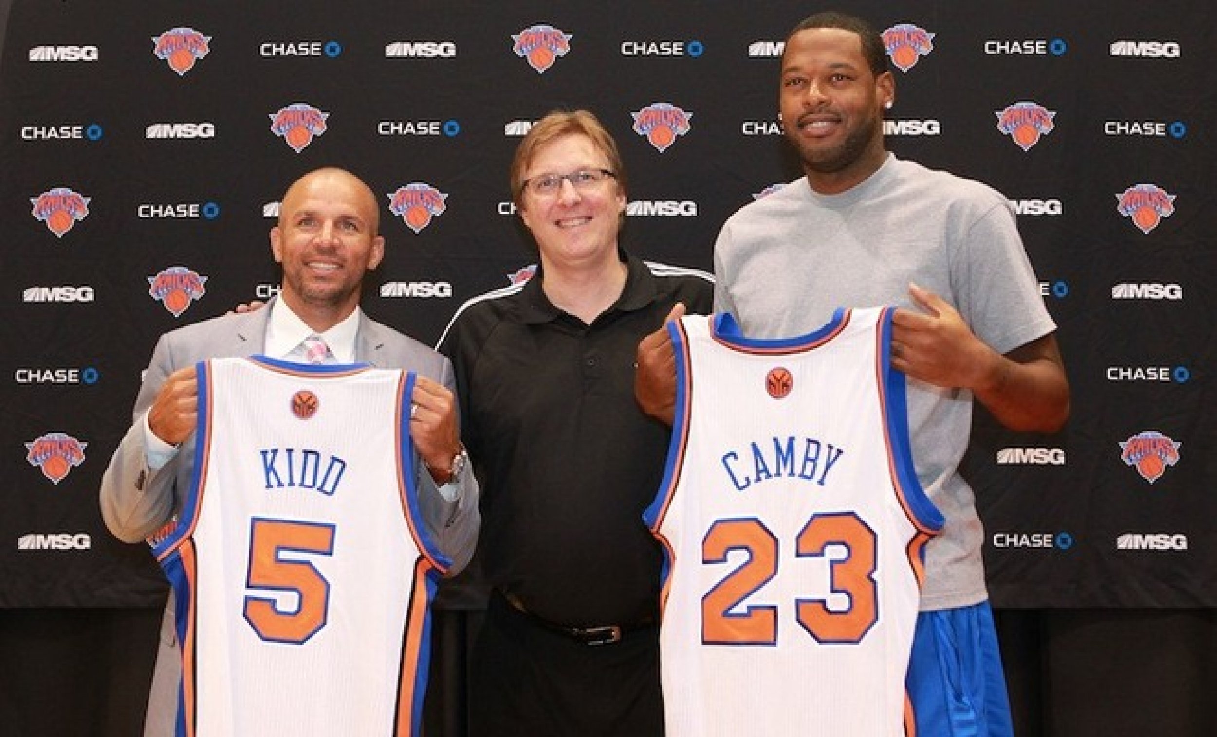 Jason Kidd l. and Marcus Camby r.