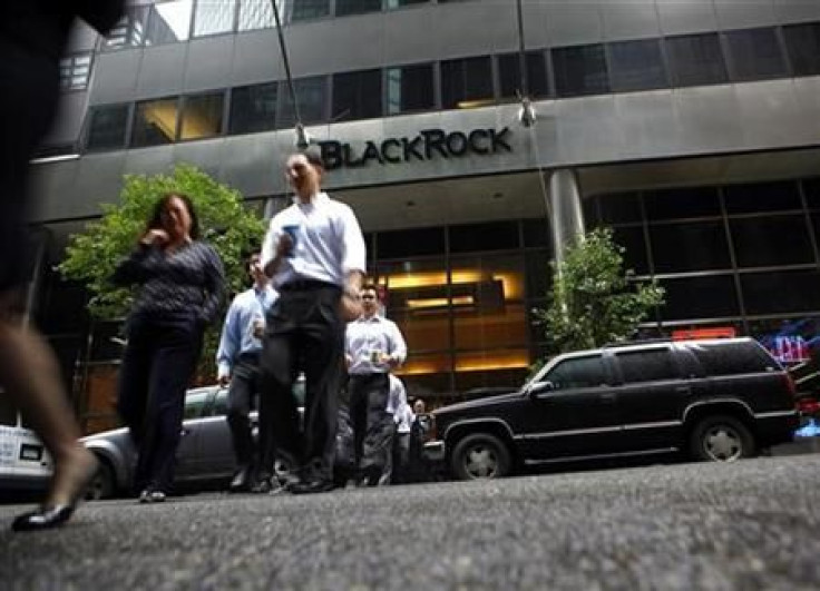 People walk outside a BlackRock building in New York