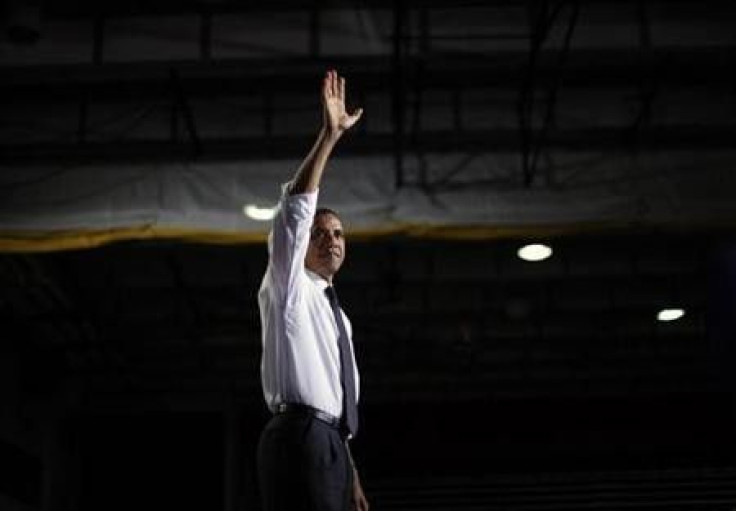 President Barack Obama waves on stage after delivering remarks on education at the University of Colorado in Denver