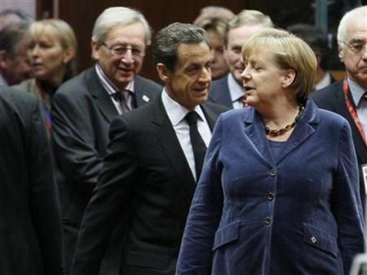 Luxembourg's Prime Minister Juncker France's President Sarkozy and Germany's Chancellor Merkel attend an European Union summit in Brussels