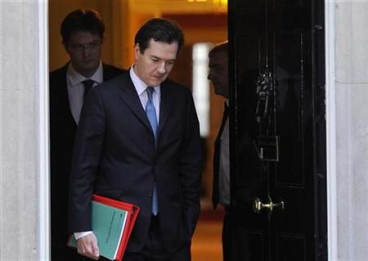 Britain&#039;s Finance Minister Osborne and Chief Secretary to the Treasury Alexander leave Downing Street in London