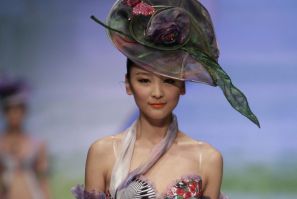 A model presents a creation for the &quot;Ordifen Cup,&quot; a lingerie design contest, during China Fashion Week for Spring/Summer 2012 in Beijing October 26, 2011