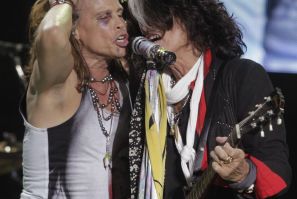 Steven Tyler (L) and Joe Perry of Aerosmith perform during a concert on the first stop of their Latin America tour at the Jockey Club in Asuncion 
