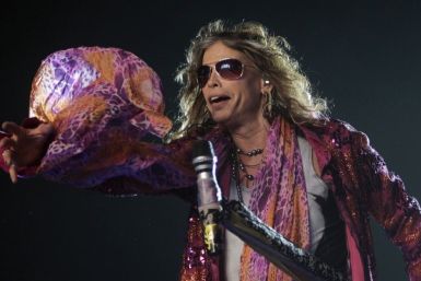 Steven Tyler, the lead singer of rock band Aerosmith, performs during a concert on the first stop of their Latin America tour at the Jockey Club in Asuncion