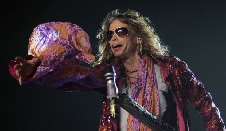 Steven Tyler, the lead singer of rock band Aerosmith, performs during a concert on the first stop of their Latin America tour at the Jockey Club in Asuncion