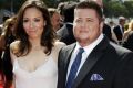 Chaz Bono (R) and Jennifer Elia arrive at the 2011 Primetime Creative Arts Emmy Awards in Los Angeles