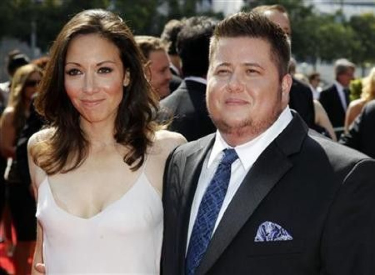 Chaz Bono (R) and Jennifer Elia arrive at the 2011 Primetime Creative Arts Emmy Awards in Los Angeles