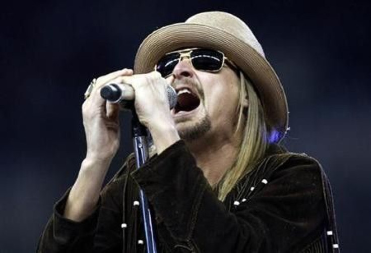 Singer and songwriter Kid Rock performs his new song and album title track ''Born Free'' during halftime of the Thanksgiving Day NFL football game between the Detroit Lions and the New England Patriots in Detroit, Michigan