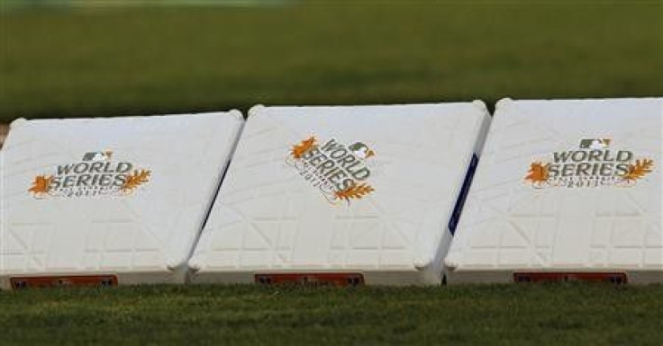 World Series bases wait to be placed on the field before Game 5 of MLB&#039;s World Series baseball championship between the St. Louis Cardinals and the Texas Rangers in Arlington, Texas