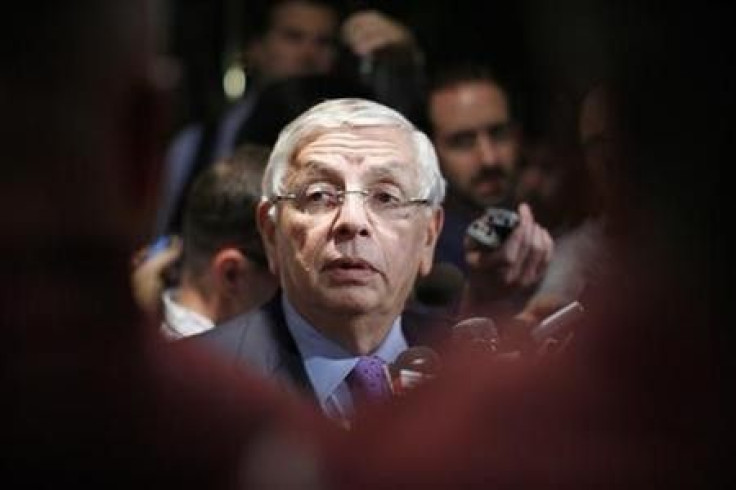 National Basketball Association commissioner David Stern (R) answers questions from members of the media outside the Louvell hotel in New York