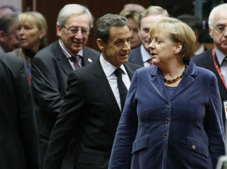Luxembourg&#039;s Prime Minister Juncker France&#039;s President Sarkozy and Germany&#039;s Chancellor Merkel attend an European Union summit in Brussels