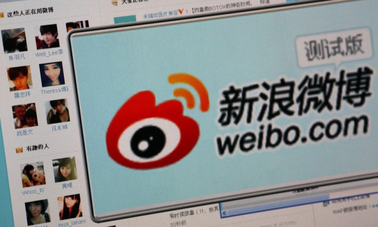 The logo of Sina Corp's Chinese microblog Web site &quot;Weibo&quot; is seen on a screen in this photo illustration taken in Beijing
