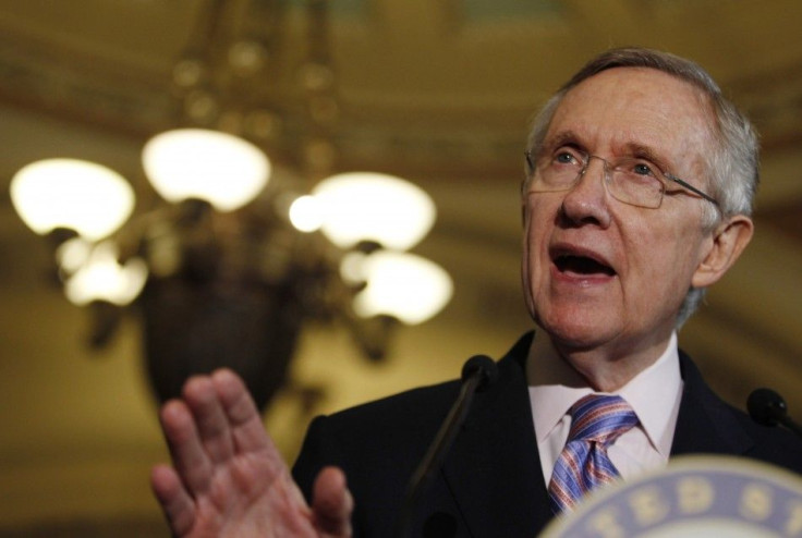 U.S. Senate Majority Leader Harry Reid speaks to the press during debt reduction talks on Capitol Hill in Washington