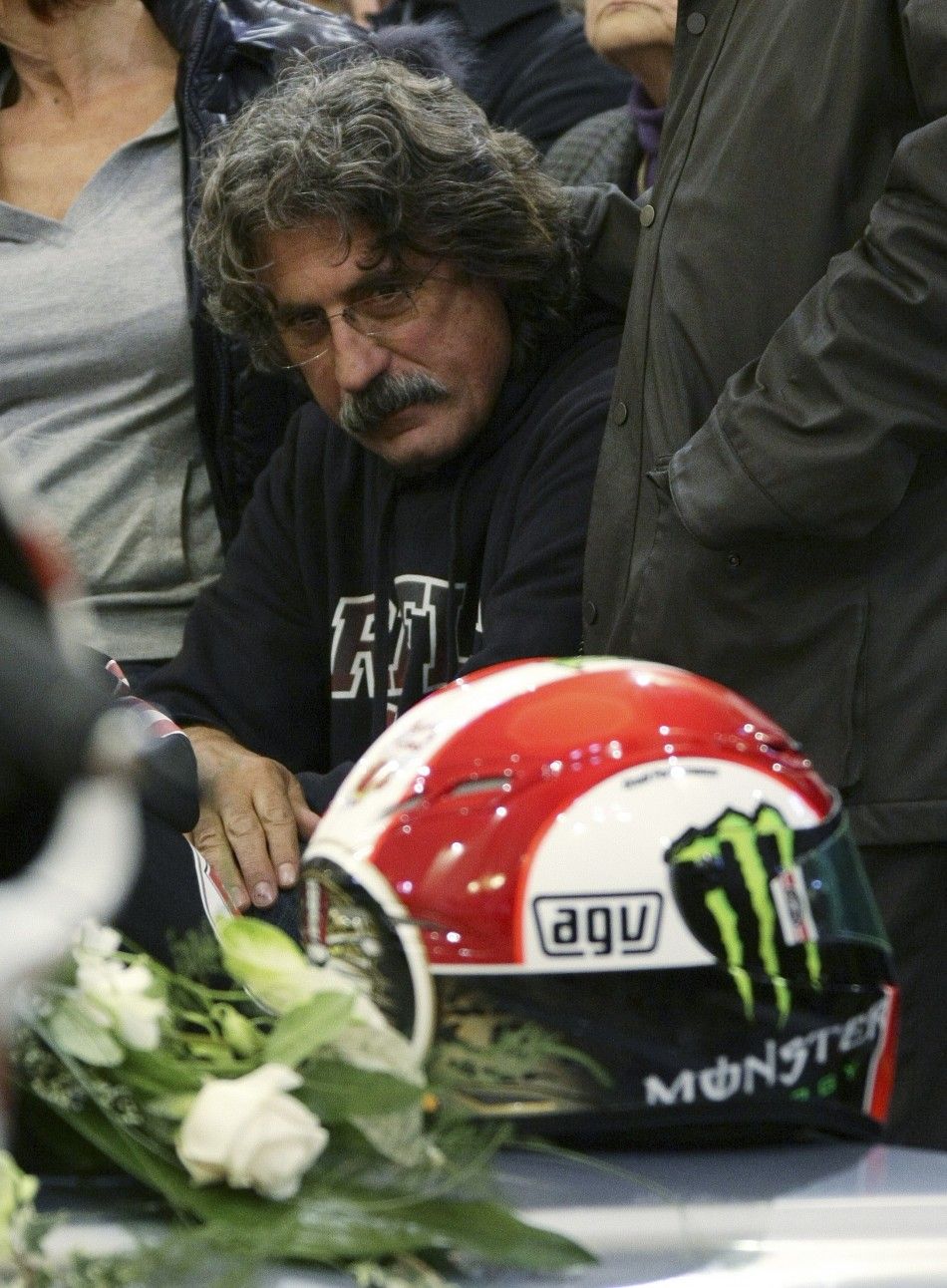 Paolo Simoncelli, the father of Marco Simoncelli, attends the funeral service of his son in Coriano