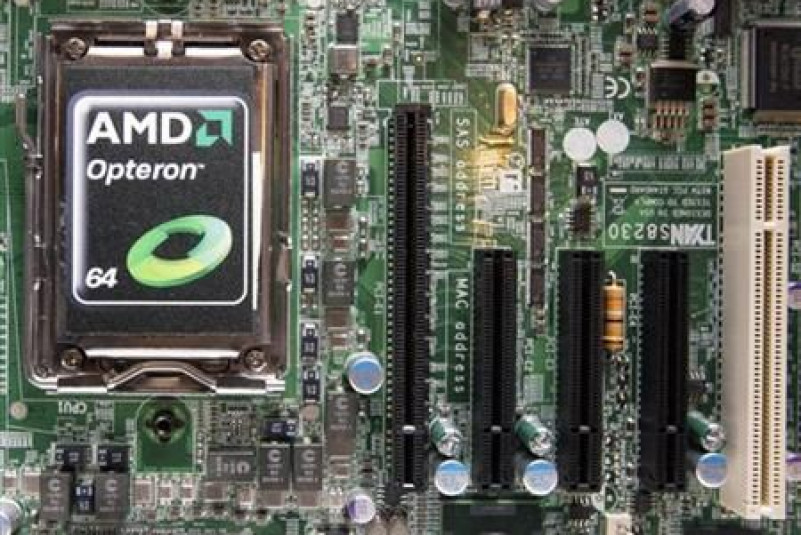A new AMD Opteron 6000 series processor is seen on a motherboard during a product launch in Taipei