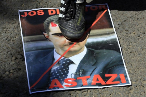 Assad poster protest