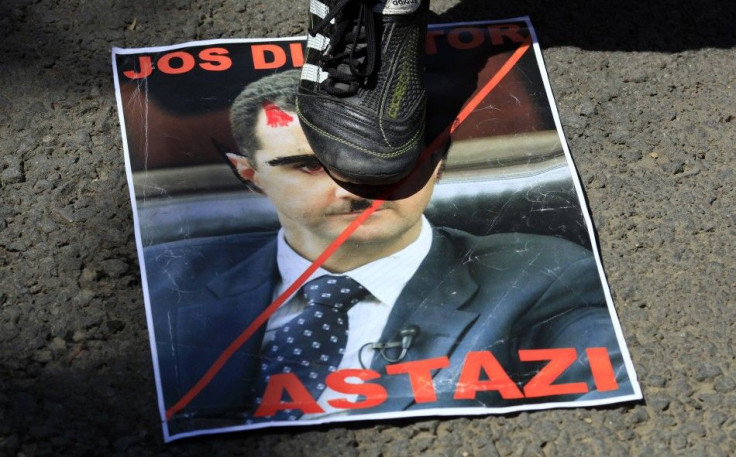 Assad poster protest