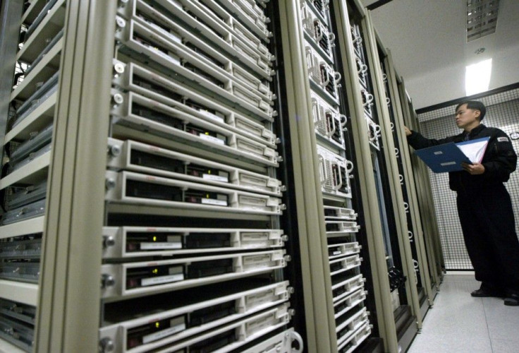 A South Korean engineer checks the status of an Internet server system at a company providing broadb..