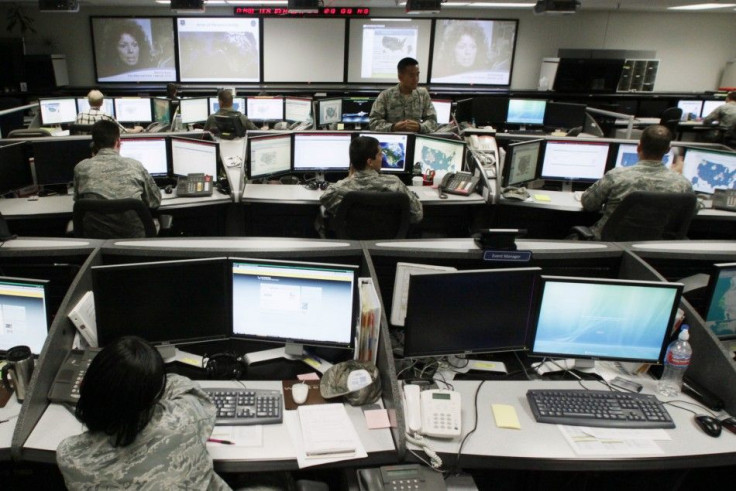 Personnel work at the Air Force Space Command Network Operations & Security Center at Peterson Air Force Base in Colorado Springs