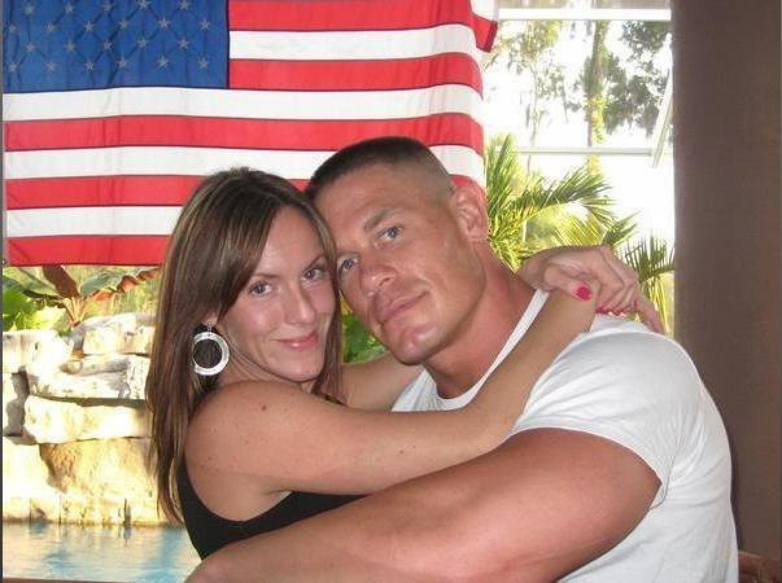 John Cena and Elizabeth Huberdeau got married on July 11, 2009.