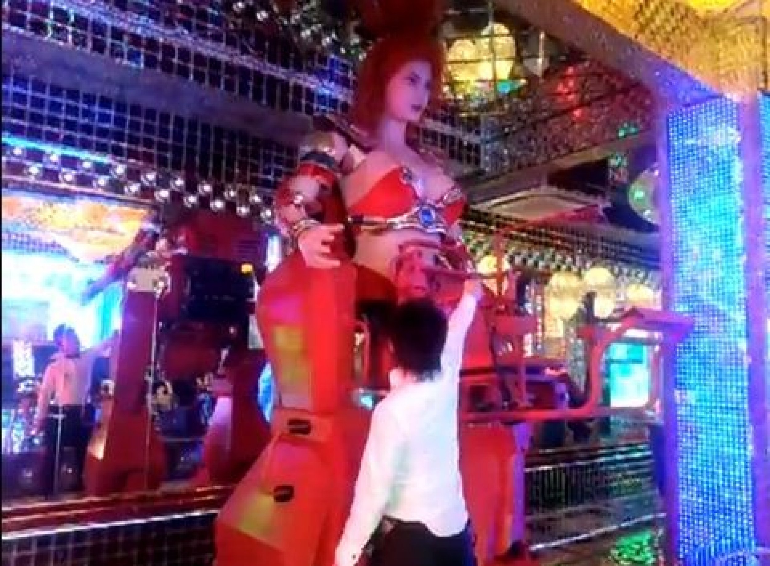 Women entertainers dance and provide adult entertainment to the customers 