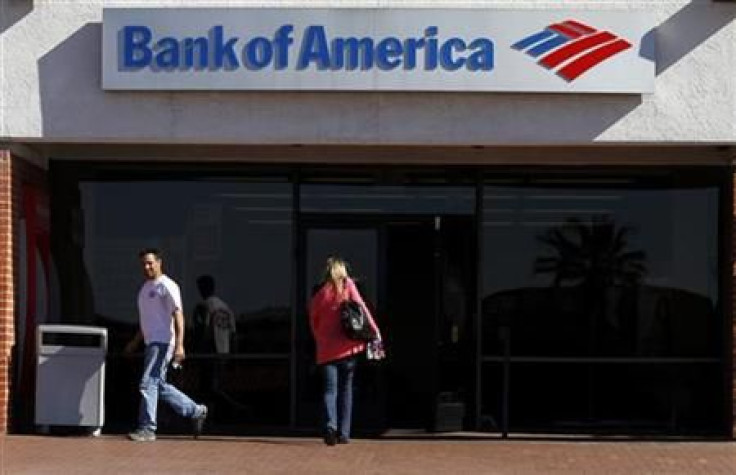 Customers are seen outside of a Bank of America in Tucson