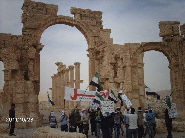 Demonstrators protest against Syria's President Bashar al-Assad in the ancient city of Palmyra