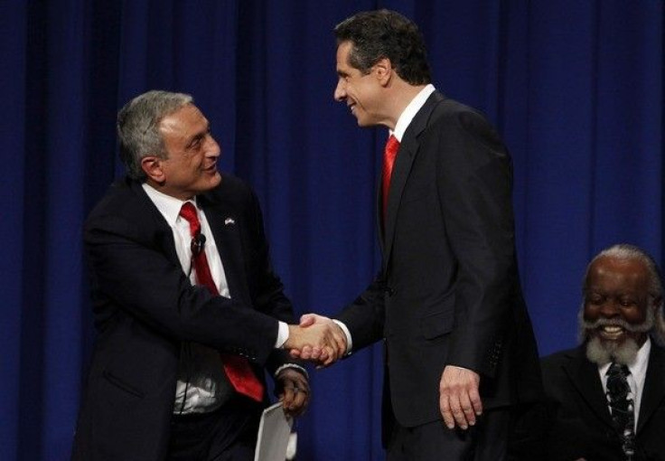 New York Gubernatorial Republican candidate Carl Paladino (L) shakes hands with New York Gubernatorial Democratic candidate Andrew Cuomo. 