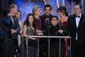 The cast of &quot;Modern Family&quot; accepts the award for outstanding performance by an ensemble in a comedy series at the 18th annual Screen Actors Guild Awards in Los Angeles, California January 29, 2012.