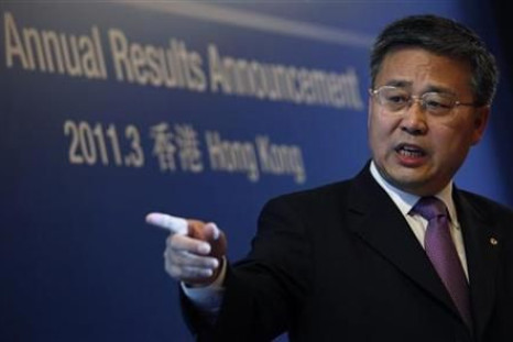 China Construction Bank Chairman Guo Shuqing speaks during a news conference announcing annual results in Hong Kong