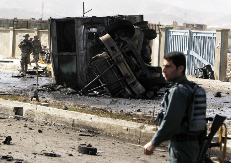 Foreign and Afghan forces arrive at the site of a suicide attack in Kabul
