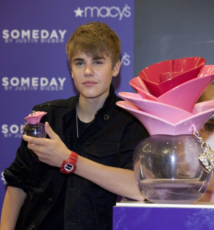 Bieber poses with his new fragrance &quot;someday&quot; during its launch in New York