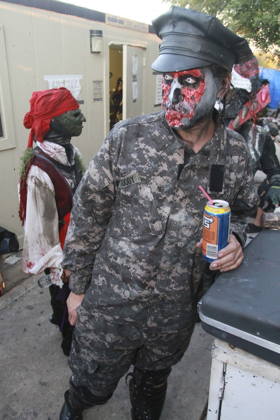 A quotcreaturequot takes a break before heading into the House of Torment haunted house in Austin, Texas