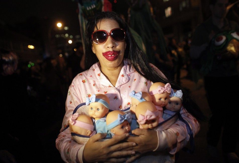 A woman dressed as Nadya Suleman nicknamed quotOctomomquot takes part in the annual Halloween parade in Greenwich Village in New York