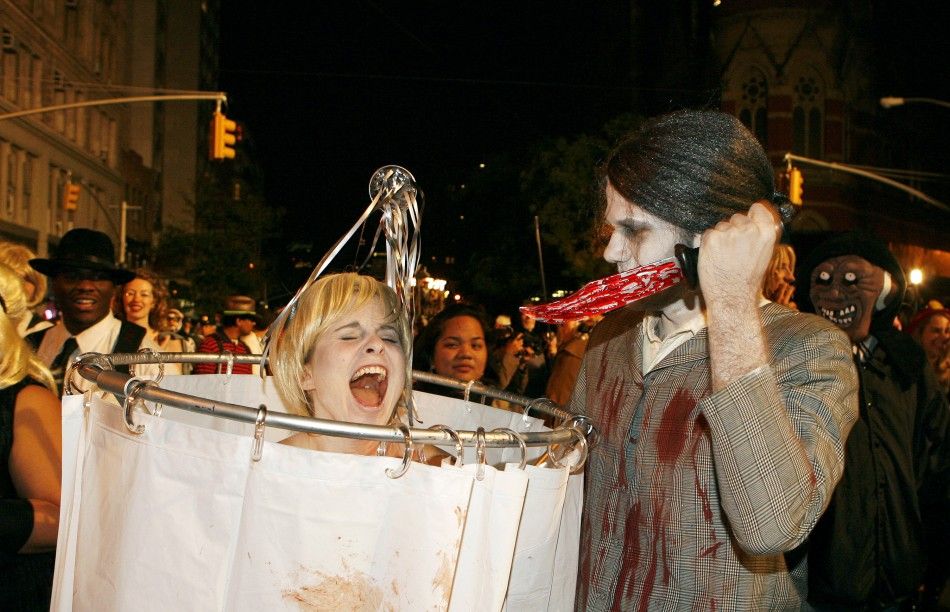 Parade participants dressed as the characters from the film quotPsychoquot take part in the annual Greenwich Village Halloween Parade in New York
