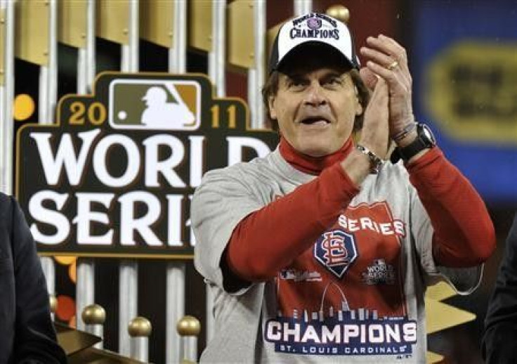 St. Louis Cardinals manager Tony La Russa reacts after his team defeated the Texas Rangers to win MLB&#039;s World Series baseball championship in St. Louis, Missouri