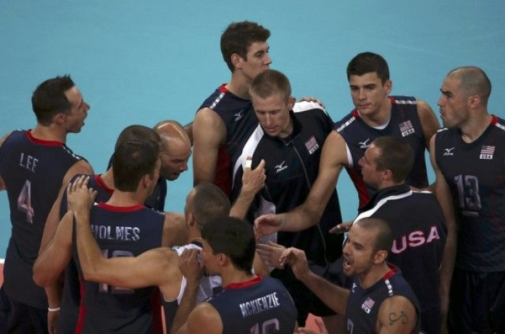 U.S. players celebrate winning their men&#039;s Group B volleyball match against Germany at the London 2012 Olympic Games at Earls Court