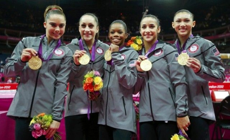 Team U.S.A members McKayla Maroney, Jordyn Wieber, Gabrielle Douglas, Alexandra Raisman, and Kyla Ross pose with their gold medals 
